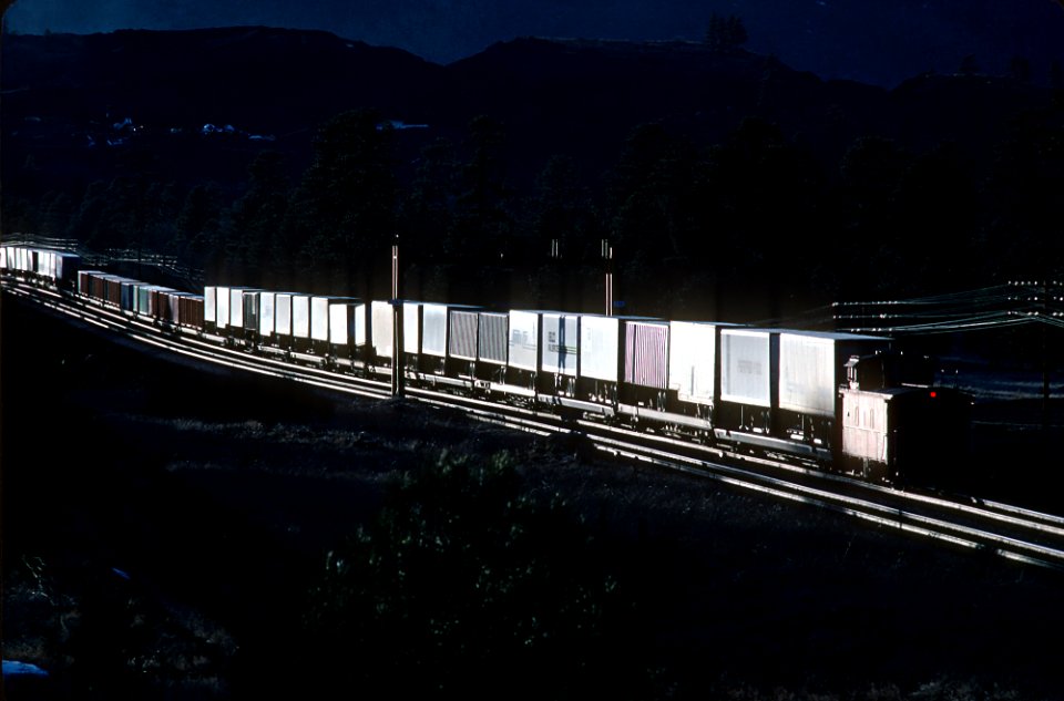 AT&SF caboose the signal bridge is near milepost 338 east of Flagstaff, AZ in March 1981 (31303179890)