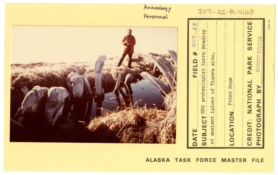 NPS archeologist Zorro Bradley at ancient igloos of Tigara site (33550460325)
