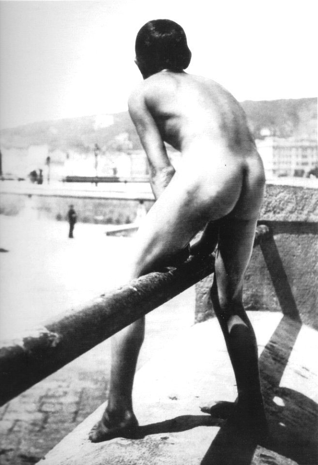 Nude little boy on beachfront of Naples, Italy 1890s