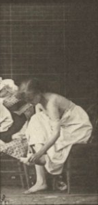 Nude woman sitting and disrobing (rbm-QP301M8-1887-498a~3)