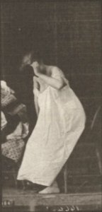 Nude woman sitting and disrobing (rbm-QP301M8-1887-498a~1)