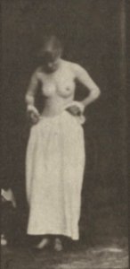 Nude woman sitting and disrobing (rbm-QP301M8-1887-498b~5)