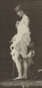 Nude woman sitting and disrobing (rbm-QP301M8-1887-498a~8)