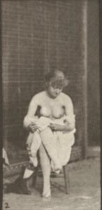 Nude woman sitting and disrobing (rbm-QP301M8-1887-498b~2)