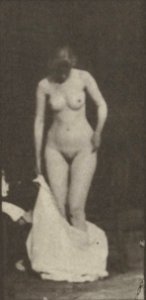 Nude woman sitting and disrobing (rbm-QP301M8-1887-498b~6)