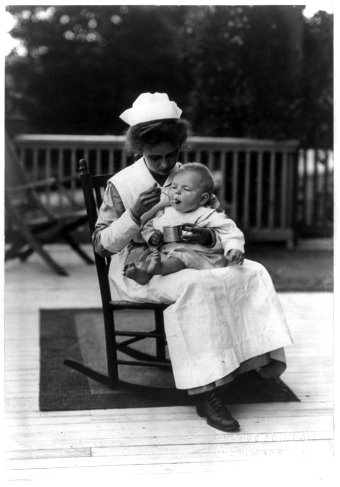 Nurse feeding baby LCCN2004672258