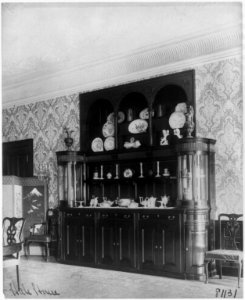 Ornate interiors of Chandler Hale house, 1001 16th St., N.W., Washington, D.C., showing piano, fireplaces, and china closet LCCN2001704524