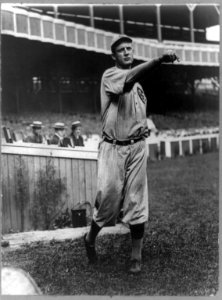 Orval Overall, baseball player for Chicago Cubs, throwing baseball in front of grandstand LCCN89714218