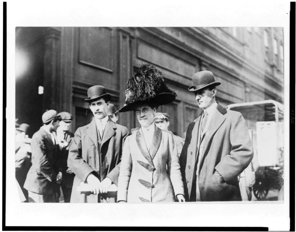 Orville Wright, William Wright, and Katharine Wright, half-length portraits, standing outdoors LCCN95507539