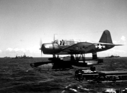 OS2U Kingfisher is catapulted from USS Quincy (CA-71) c1944