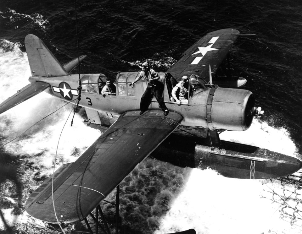 OS2U-3 Kingfisher is recovered by USS Baltimore (CA-68) off Truk on 18 February 1944 (80-G-218123)