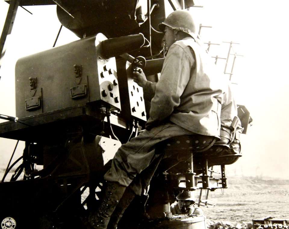 Oscilloscope operators on an SCR 268 radar maintain watch near Menella, Italy, WWII (39728909704)