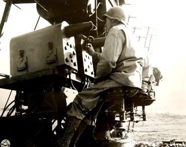 Oscilloscope operators on an SCR 268 radar maintain watch near Menella, Italy, WWII (39728909704)