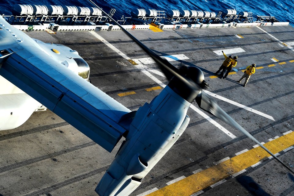 Osprey takes off aboard USS Peleliu 141024-N-NZ935-032