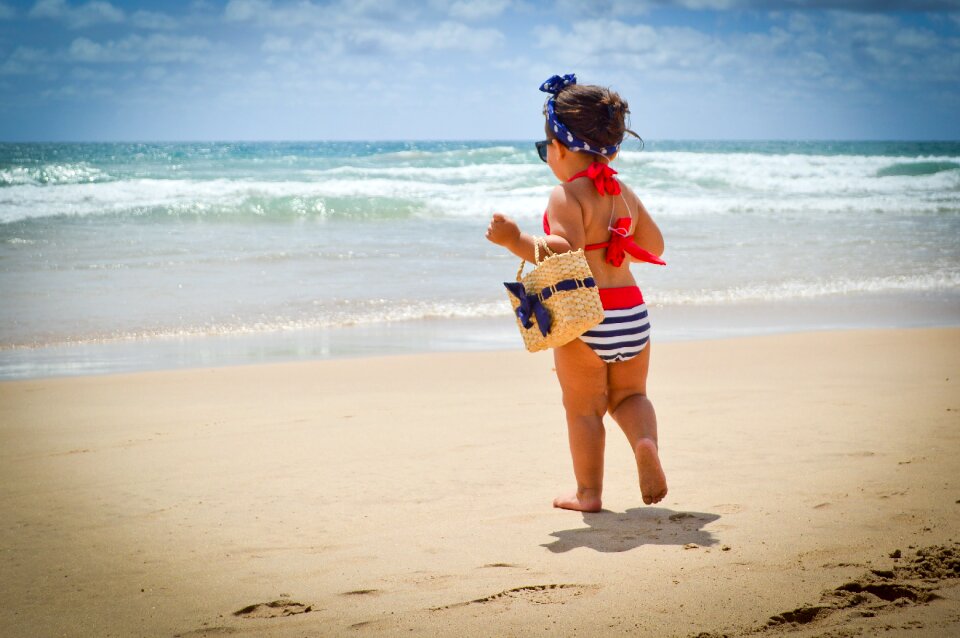 Happy beach child playing