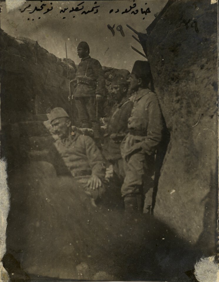 Ottoman infantryman keeping watch over enemy from trench
