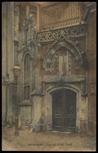 Oudekerksplein 23 met de ingang naar de Oude Kerk. Uitgave Brouwer & De Veer, Amsterdam, Afb PBKD00320000009