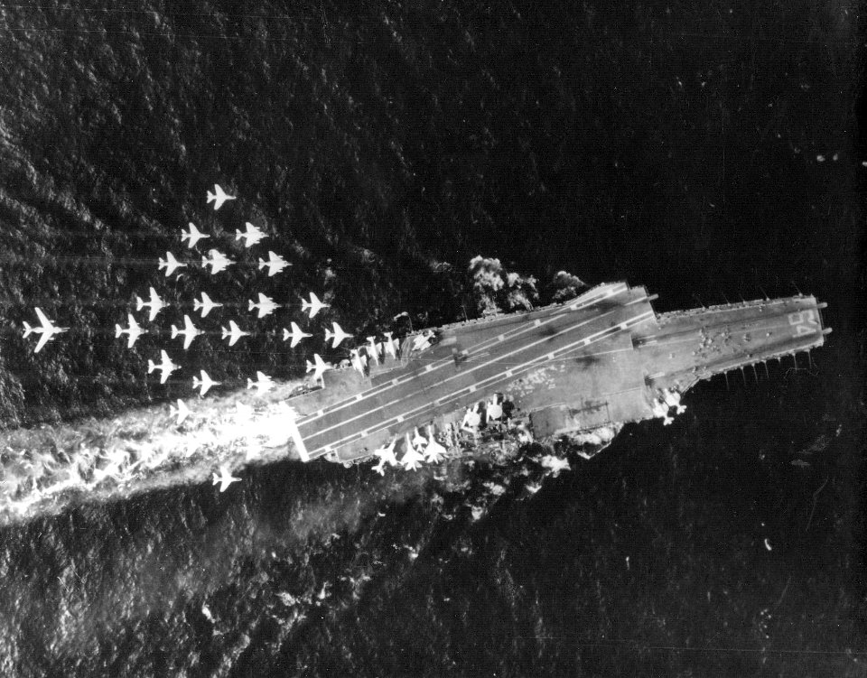 Overhead view of USS Constallation (CVA-64) underway, in the early 1970s (NNAM.1996.488.103.054)