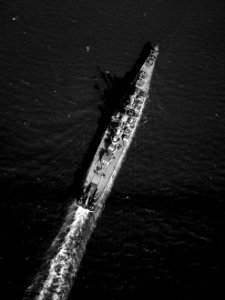 Overhead view of USS Newport News (CA-148) underway c1949