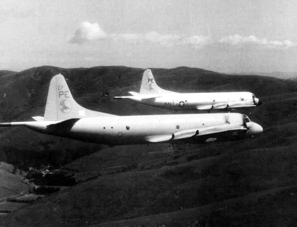 P-3C Orions of VP-19 in flight over California c1990