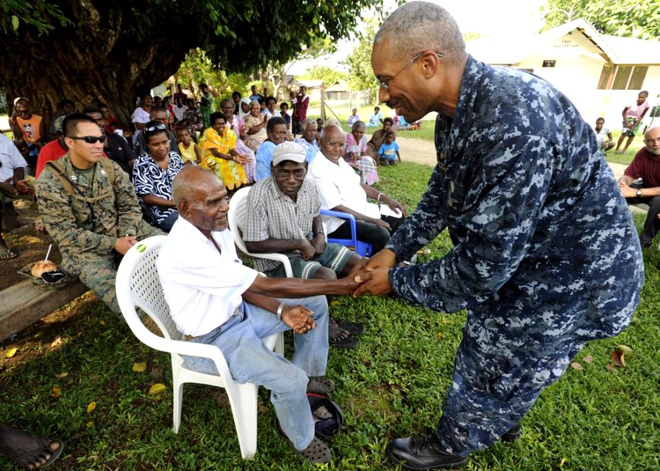 Pacific Partnership commander meets oldest man in Hog Harbor 110504-N-YM863-554