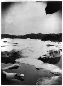 Pack ice forming off the coast of Labrador, with land visible in the background LCCN2012645570