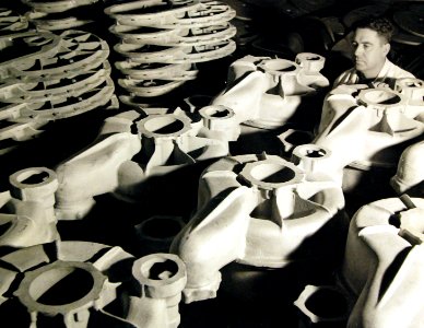 Packard Motor Car worker checking impeller casings for torpedo boats, 1941 (25973506224)