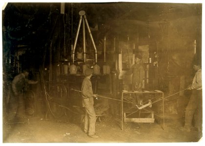 O'Neill Bottle Machine, Mannington Glass Wks., Mannington, W. Va. Blows bottles by compressed air. Managers do not believe in using small boys or girls and do not do it- large boys are paid LOC nclc.01189 photo