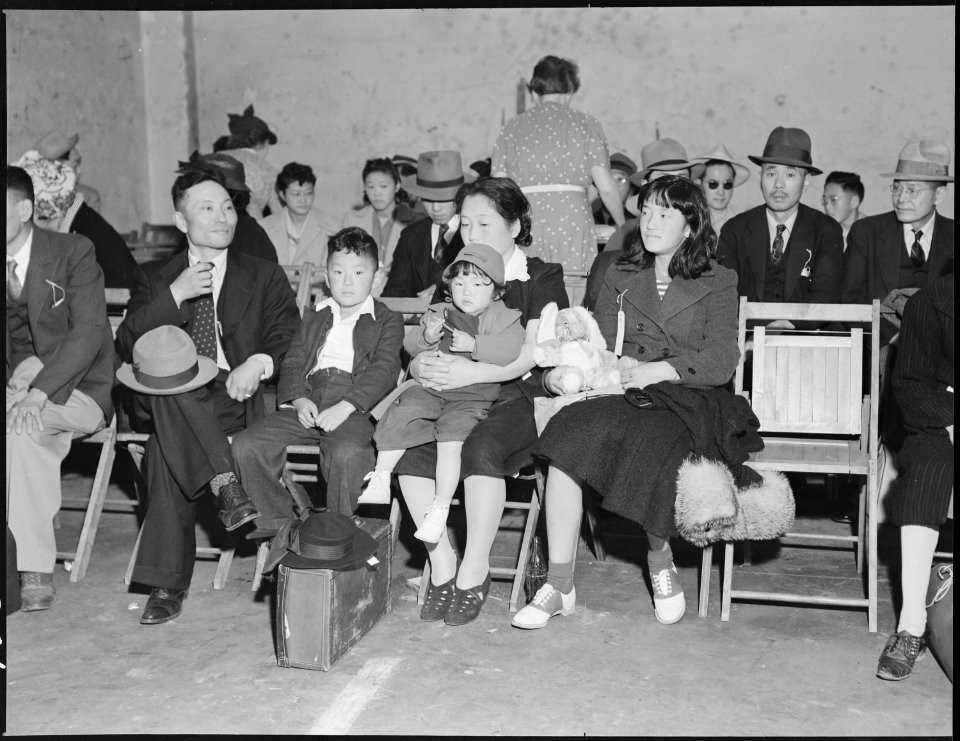 Oakland, California. Evacuees at the Wartime Civil Control Administration Control station awaiting . . . - NARA - 537708