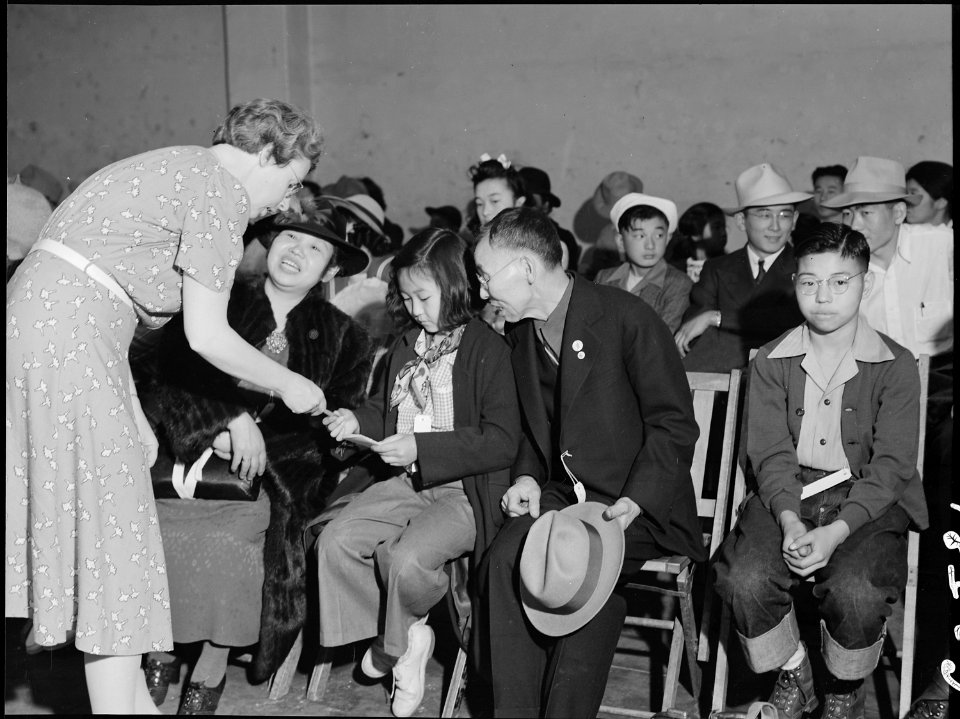 Oakland, California. Mr. and Mrs. Kitagaki with two of their children at the Wartime Civil Control . . . - NARA - 537891
