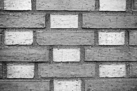 Masonry checked white and gray checked brick wall