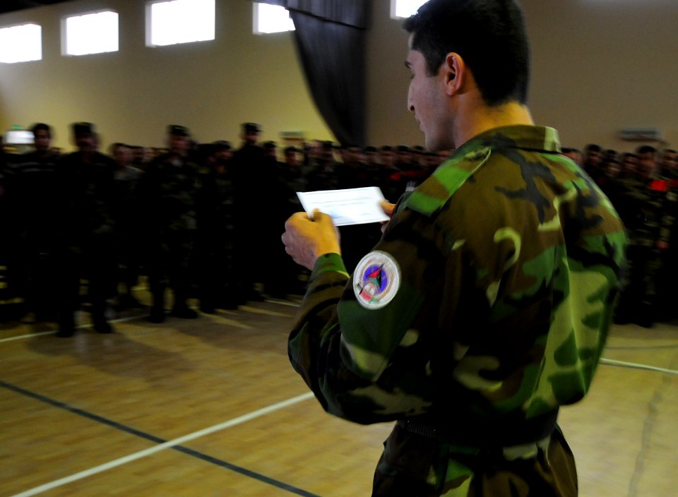Officer Cadet Zakrya announces his eventual duty station to his class mates and senior leaders during a placement lottery (4382794874)