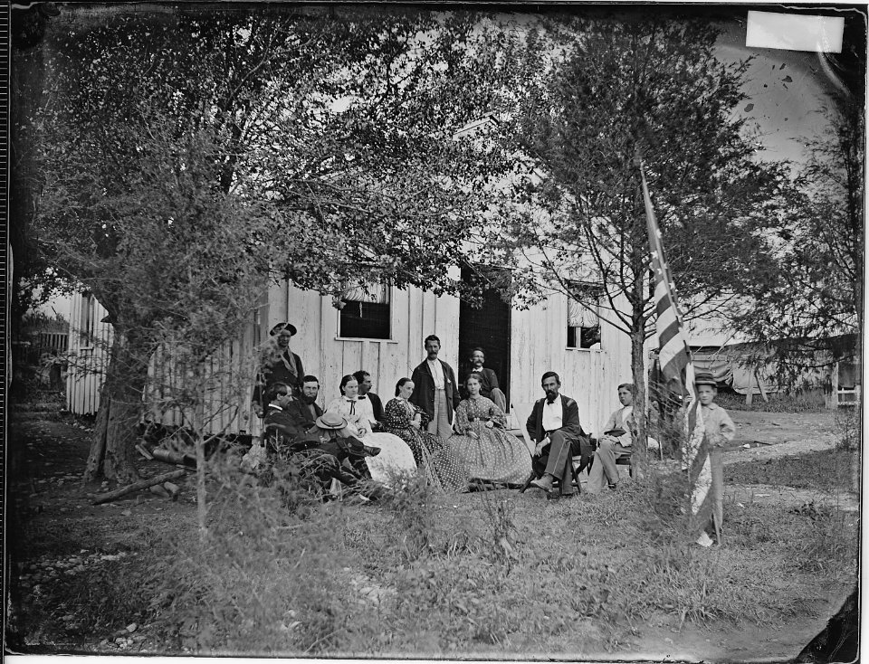 Officer's family on visit to quarters - NARA - 529312