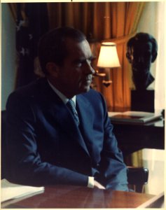 Official Presidential portrait. Richard M. Nixon seated in the oval office. - NARA - 194327