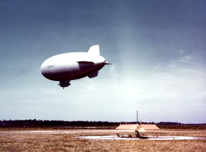 A U.S. Navy K-class blimp flies low over a naval air station, circa in 1943-1944 (80-G-K-13733) photo