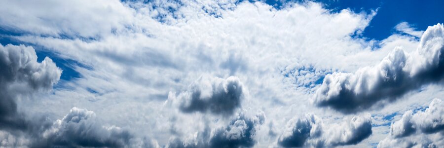 Clouds form storm clouds banner photo