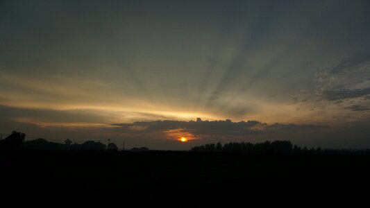 Cloud gap light at dusk sun