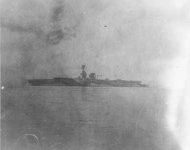 HMS Furious in 1918 with two airplanes on her landing-on deck, aft of the funnel. (51105362432)