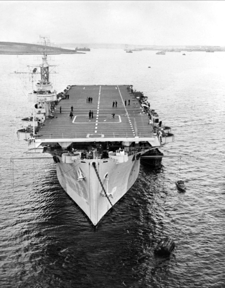 HMS Queen (D19) Ex USS St.Andrews (CVE-49) moored to the barrel in Scapa Flow May 1945. (49462462562)