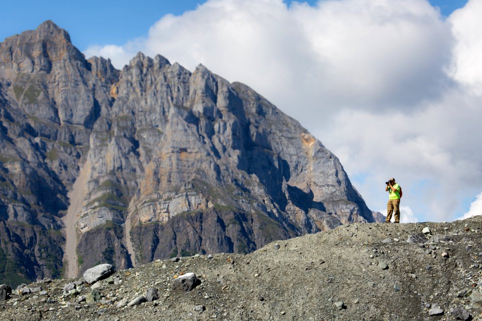 Jacob Frank photographing along the Kennicott Glacier, Donoho Basin (26156280308)