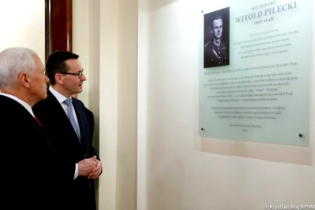 Polish Prime Minister Mateusz Morawiecki and US Vice President Mike Pence. The plaque of Witold Pilecki a volunteer to Auschwitz photo