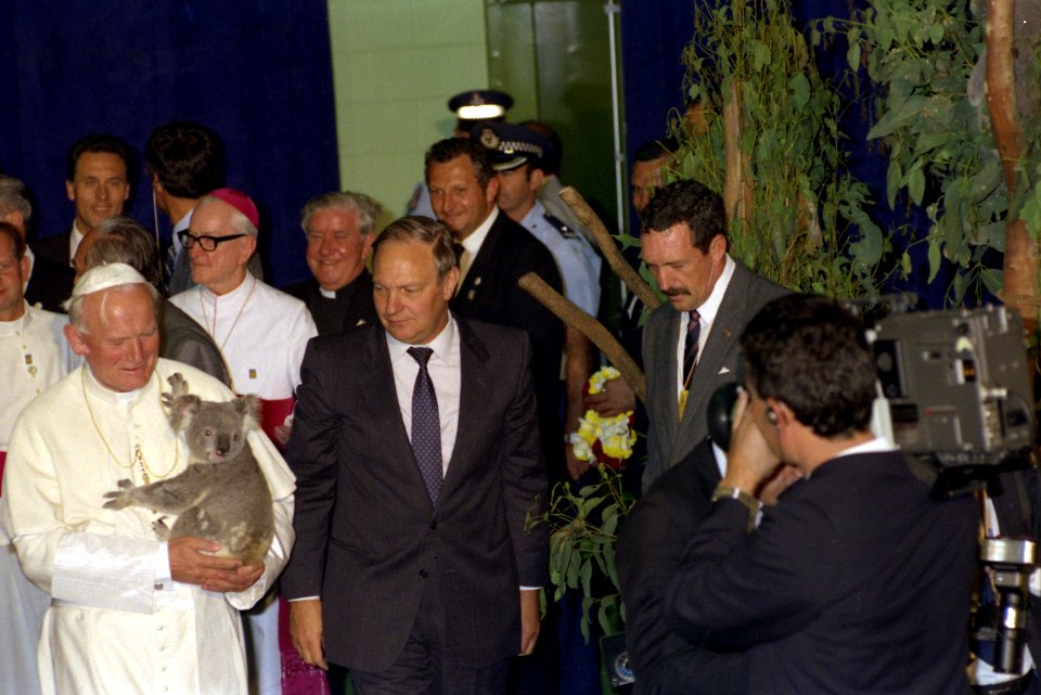 Pope John Paul II holding a koala and meeting with media, Brisbane, 25 November 1986