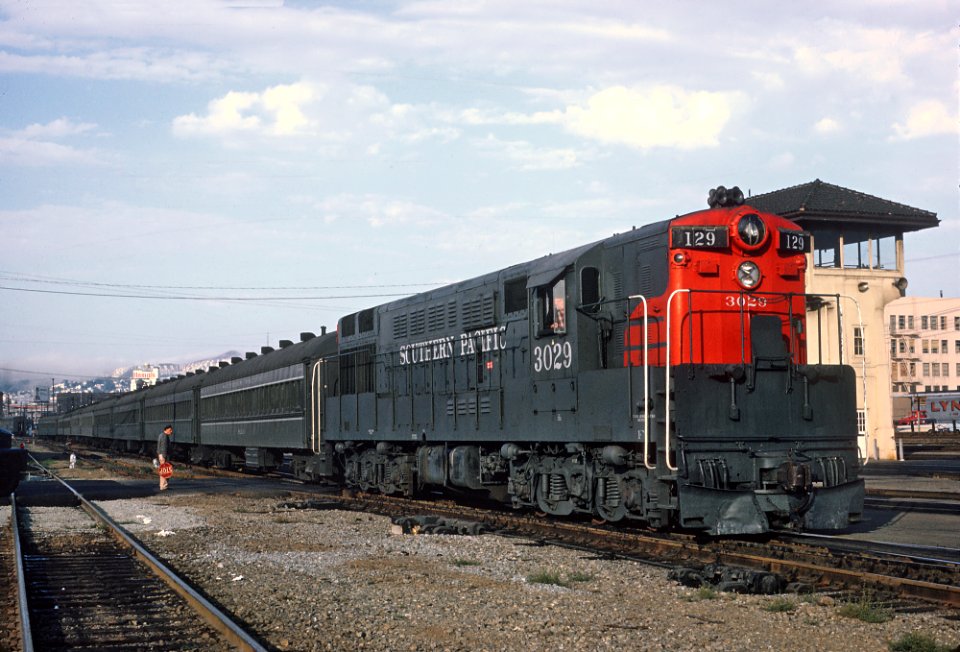 SP 3029 (FM H-24-66 Trainmaster) with Train 129 at the SP's Old 4th Street Tower, San Francisco, CA on August 25, 1967 (32682695500)