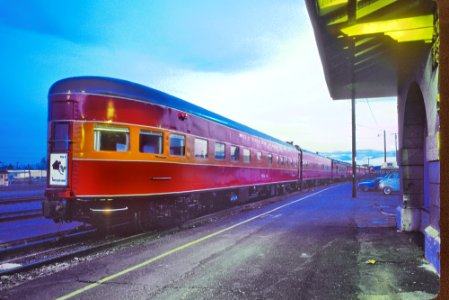 SP 4449 with the Disney Daylight with ex-CB&Q MINNEAPOLIS CLUB, one of the Burlington's contribution to the NP North Coast Ltd, at Klamath Falls, OR evening in March 1986. It spent the night. (33143570362)