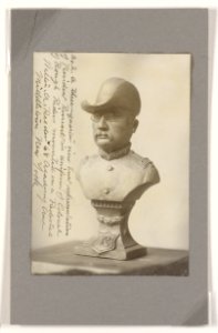 A three-quarter view bust representation of President Roosevelt in uniform of Colonel of Rough Riders, mounted on a pedestal LCCN2013651266