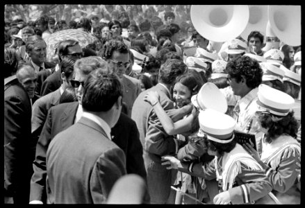A Teenage Girl Hugs President Richard Nixon as He Greets People in a Crowd upon Arrival in Harlingen, Texas photo