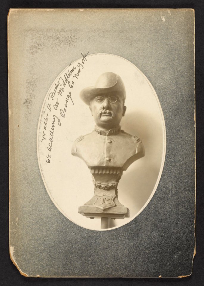 A three-quarter view bust representation of President Roosevelt in uniform of Colonel of Rough Riders, mounted on a pedestal LCCN2013651269