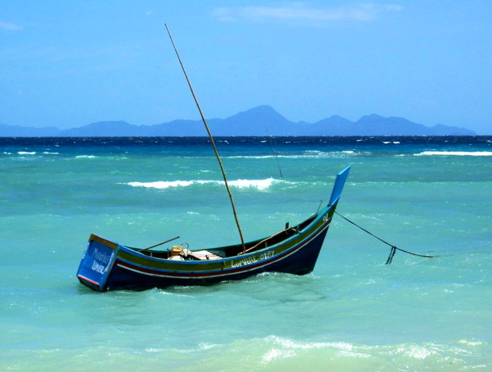 A traditional boat anchored off the coast of aceh (5074343314)