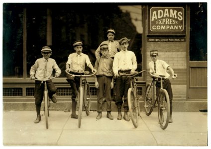 A typical group of Postal Messengers in Norfolk, Va. Smallest on left end, Wilmore Johnson, been there one year. Works days only. The Postal boys are not nearly so young, in Norfolk and also LOC nclc.03730