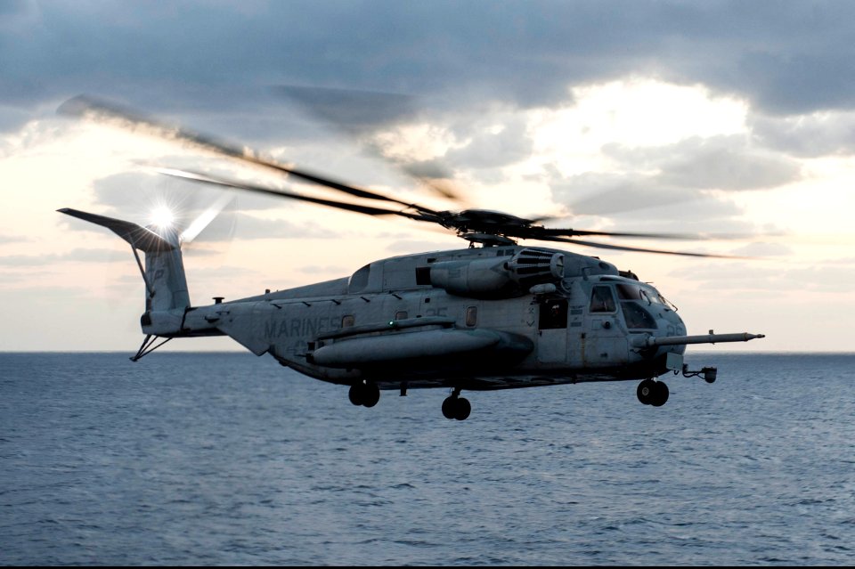 A U.S. Marine Corps CH-53 Super Stallion helicopter assigned to Marine Medium Tiltrotor Squadron (VMM) 265 takes off from the amphibious assault ship USS Bonhomme Richard (LHD 6) in the East China Sea March 10 140310-N-LM312-095